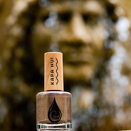 rainbows end natural nail polish next to shrine