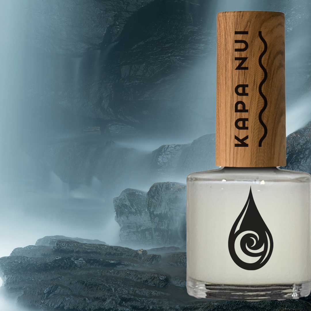 non toxic nail polish 9ml bottle next to water fall with black rocks