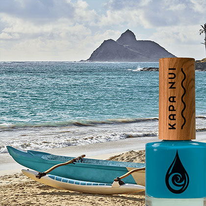 kailua bay non toxic nail polish bottle next to kailua bay beach