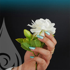 kapoho non toxic nail polish hand with flower