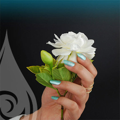 kapoho non toxic nail polish hand with flower