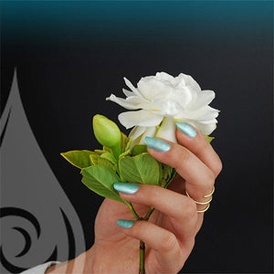 kapoho dreams non toxic nail polish hand with white flower