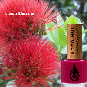 lehua blossom non toxic nail polish bottle next to lehua blossoms