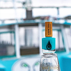 nalu non toxic nail polish next to blue boat