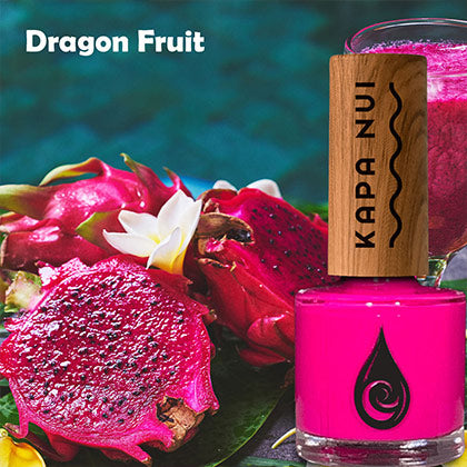 dragon fruit non toxic nail polish bottle next to cut up dragon fruit