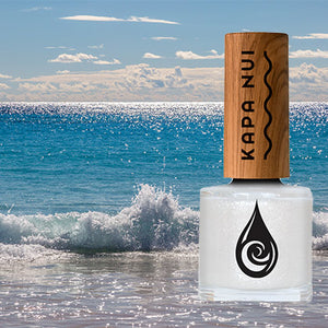 non toxic nail polish in olili color next to sparkling waves