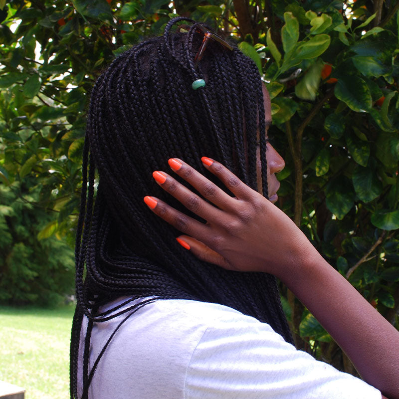 woman wearing olena non toxic nail polish