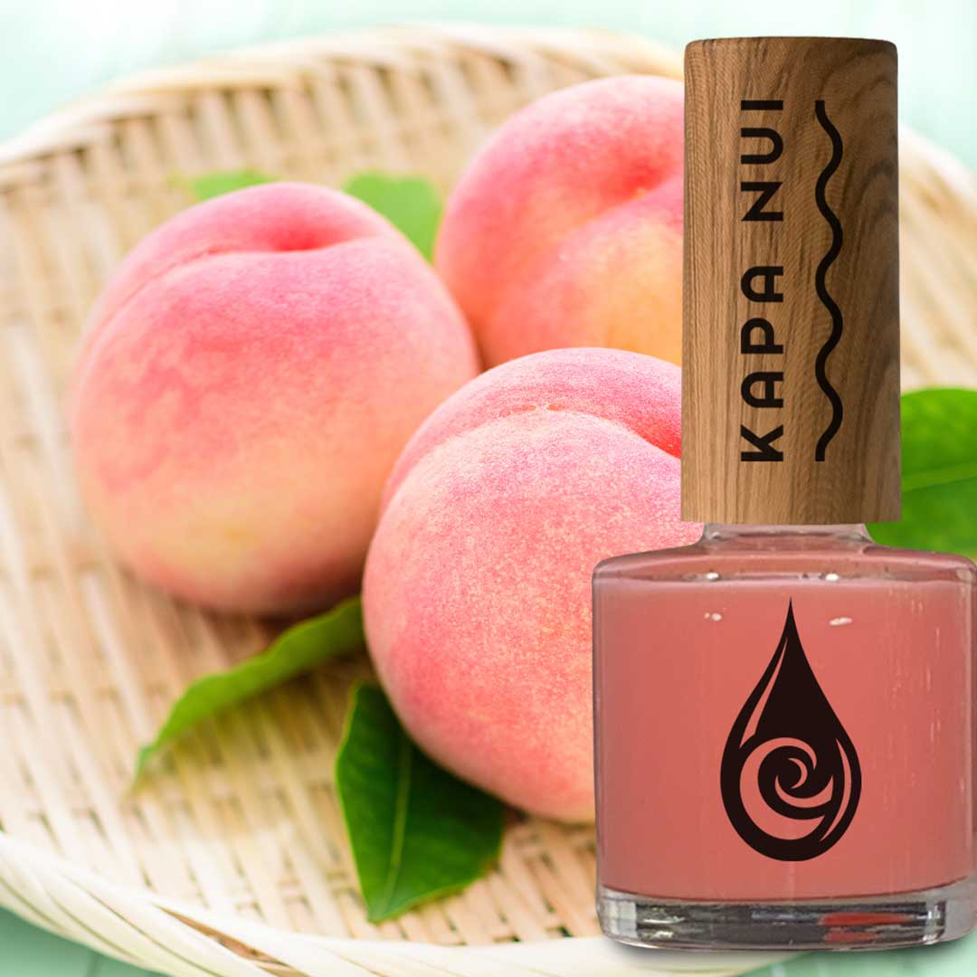 piki non toxic nail polish 9ml bottle next to peaches