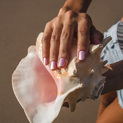 seashells heart non toxic nail polished hands holding seashell