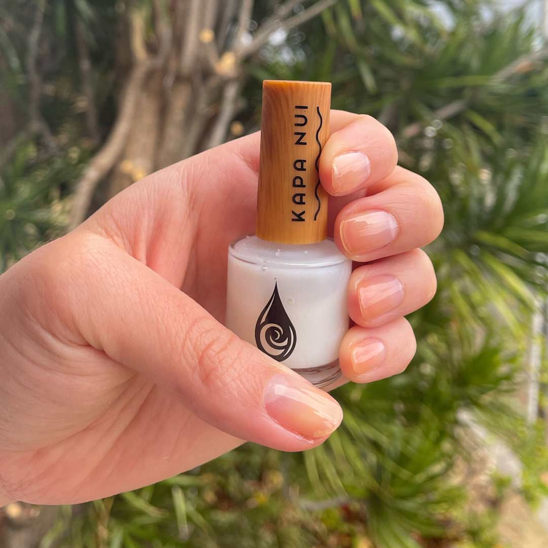 uhi non toxic nail polish bottle inside hand model